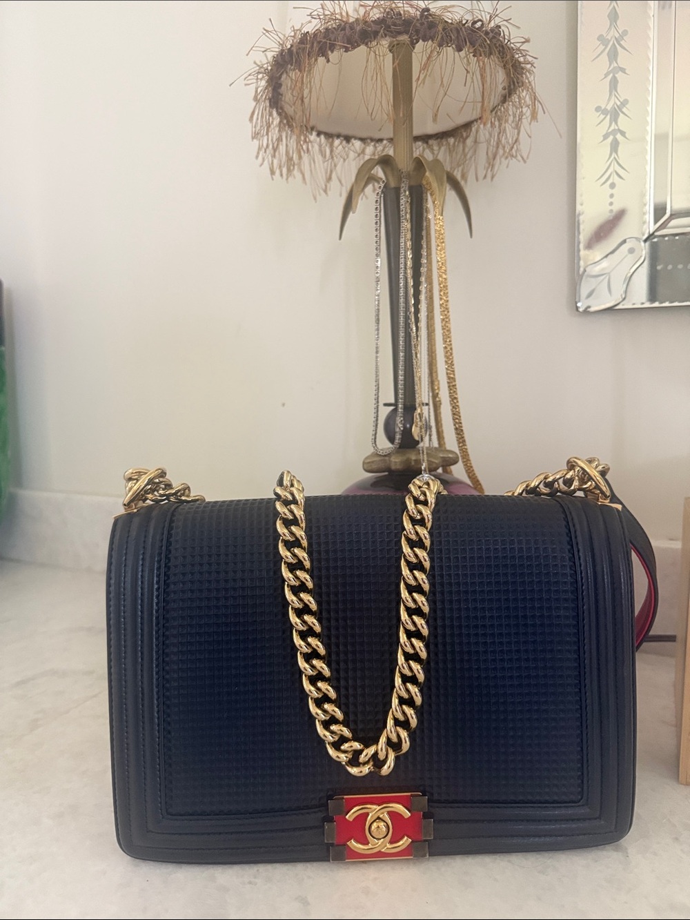 CHANEL Black Leather Shoulder Bag with Gold Chain and Red Accent - Picture 2 of 16